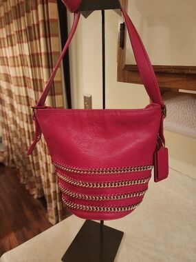 vibrant Coach Whiplash Mini Duffle Bag in Pink Ruby refined pebble leather
